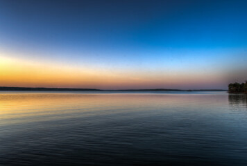 Tranquil HDR Lake Sunset with Soft Gradient Sky