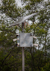 Complex of video cameras and motion sensors with solar panel and an antenna for transmitting signal from the control area.