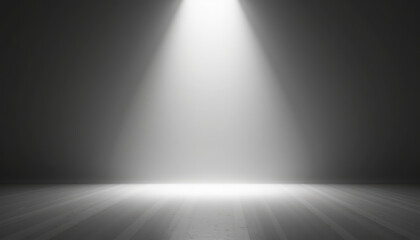 Naklejka premium Bright spotlight shining down on an empty stage, creating an inviting atmosphere for various performances or presentations.