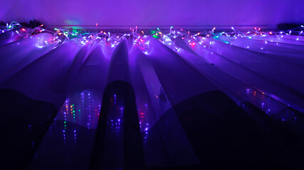 glow of colored diodes on a garland