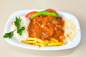 Lavash zurna doner kebab ( zurna  durum )  or shawarma sliced in plate isolated.  hatay usulu tavuk Et doner durum. Gobit ekmek arasi doner. Pilavustu iskender doner kebap. 