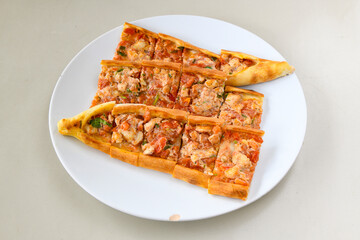 Kiymali pide.Turkish pide with minced meat. Turkish pizza mince pita Pide on white . Etli ekmek.Kusbasi kasarli, kiymali kasarli, kiymali yumurtali, Bafra, Trabzon, Kusbasili pide. Urfa acili lahmacun