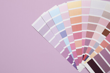 Many color palettes on light purple background