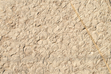 Beautiful limestone surface with natural uneven fracture and diagonal crack. Fragment of a rock....