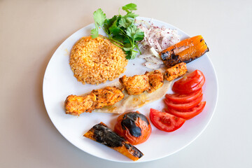 Chicken wings barbeque in a dish with BBQ grill sauce . Izgara tavuk kelebek sis kanat. Izgara tavuk sis, gogus.
