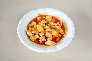 Sauteed chicken with carrots and peas . Turkish ; Tavuk Sote 