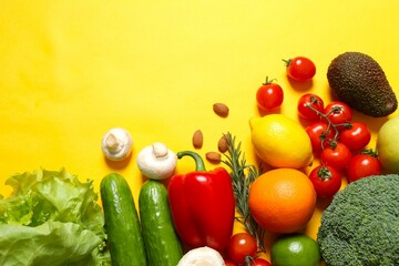 Clean healthy eating habits concept. Fruits, herbs, greens and vegetables mix, colorful juicy organic detox smoothie juice ingredients, color background. Vegan vegetarian diet food