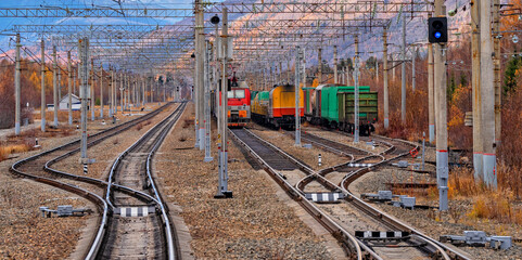 Railroad and trains with wagons. Train traffic. Transportation industry