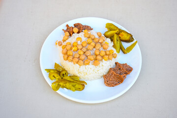 Traditional delicious Turkish food; Turkish style rice pilaf (Turkish name; Arpa sehriyeli. tavuk, kuru fasulyeli, pirinc pilavi). Cigerli, kavurmali, tereyagli nohut pilav.
