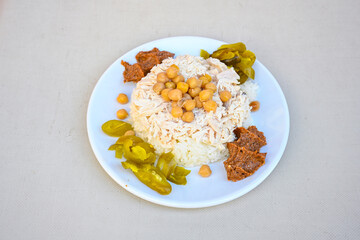 Traditional delicious Turkish food; Turkish style rice pilaf (Turkish name; Arpa sehriyeli. tavuk,...