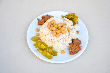 Traditional delicious Turkish food; Turkish style rice pilaf (Turkish name; Arpa sehriyeli. tavuk, kuru fasulyeli, pirinc pilavi). Cigerli, kavurmali, tereyagli nohut pilav.

