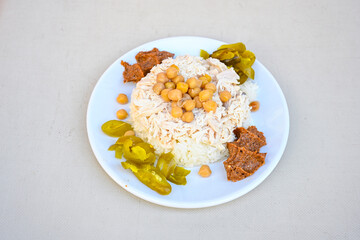Traditional delicious Turkish food; Turkish style rice pilaf (Turkish name; Arpa sehriyeli. tavuk,...