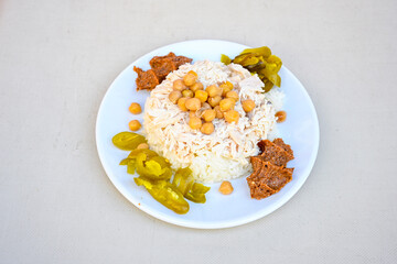 Traditional delicious Turkish food; Turkish style rice pilaf (Turkish name; Arpa sehriyeli. tavuk, kuru fasulyeli, pirinc pilavi). Cigerli, kavurmali, tereyagli nohut pilav.
