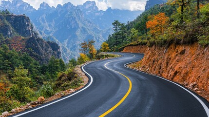 Fototapeta premium Winding mountain road, autumn foliage, China, travel