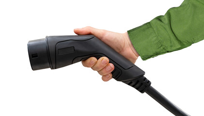 Isolated black EV charging plug in female hand. Electric car charging connector.	