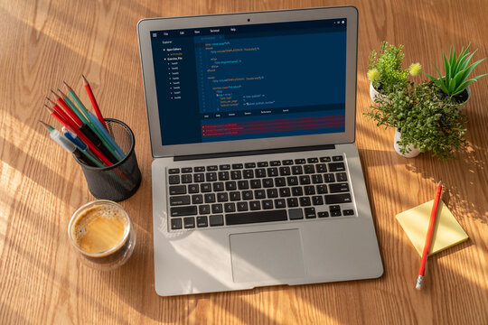 Software development programming on computer screen for modish application and program coding