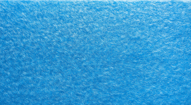 A high-resolution top-view photograph of a blue felt background with a flat, highly detailed surface. The texture is sharp and even, with no shadows, text, objects, or additional elements disrupting t