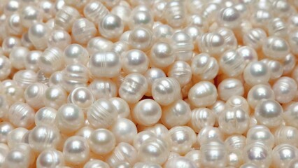 Close up of white scattered pearls