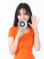 Obraz premium woman in a snug orange t-shirt, black medium hair, shouting into a megaphone, smiling brightly against a white background
