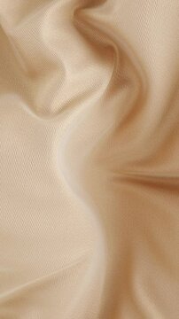 Abstract golden fabric silk looped background, luxury fashion wavy cloth seamless animation. Elegant textile material ripples. 3D minimal crumpling texture