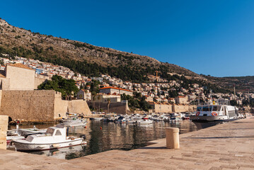 DUBROVNIK, Croatia Defensive walls of the old city of Dubrovnik. View of the modern city which is opposite the old town.
