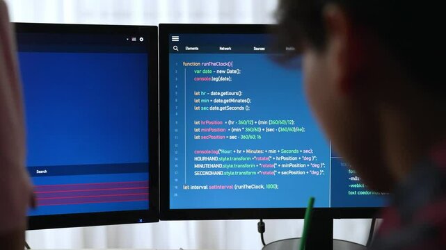Back end software developer engineer for computer programming working together on debugging writing computing code, solving complex algorithms display on monitor in office. Burgeoning