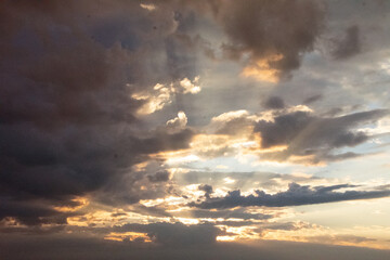 Light coming through the clouds at dawn