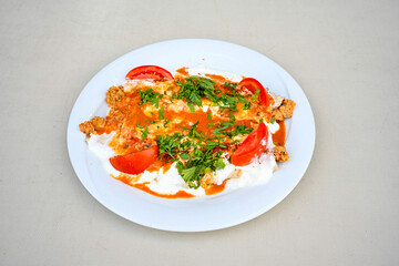 Meat, chicken shawarma kebab with yogurt and fried butter sauce .Tantuni Special. Yogurtlu tantuni.