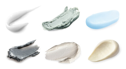Samples of different creams isolated on white, top view