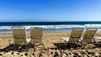 Empty beach chairs in Puerto Rico