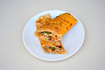 Meat, chicken shawarma kebab with yogurt and fried butter sauce .Tantuni Special. Yogurtlu tantuni.