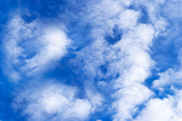 blue sky with beautiful white clouds on a spring day.