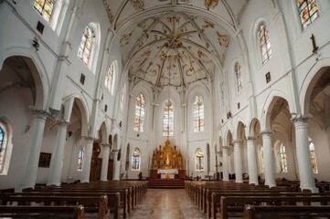 Fototapeta premium Charming White Church Surrounded by Palm Trees