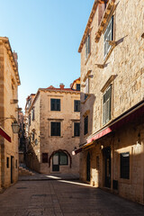 Obraz premium A street view in the old town of Dubrovnik, Croatia. Empty streets without tourists.