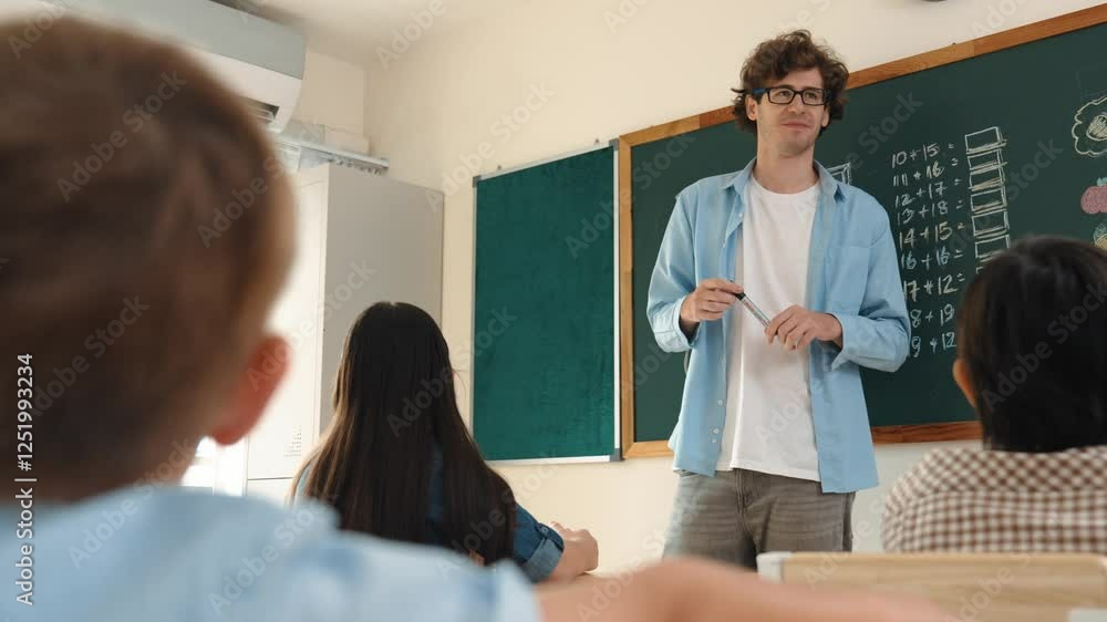 Poster professional mentor looking around classroom while standing in front of blackboard with math formula