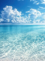Fototapeta premium Pristine Tropical Beach With Clear Water featuring white sand, turquoise sea, and a blue sky with scattered clouds, creating a serene and idyllic coastal scene.