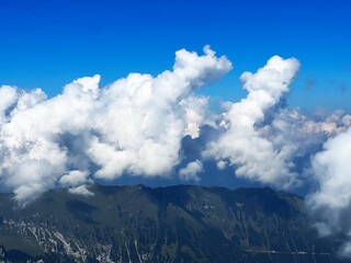 Beautiful photogenic clouds over the Uri Alps massif in the Swiss Alps, Melchtal - Canton of Obwalden, Switzerland (Kanton Obwald, Schweiz)
