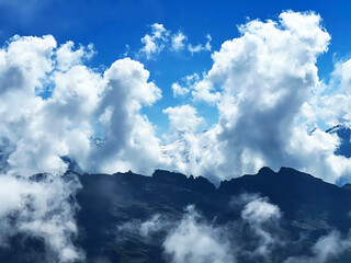 Beautiful photogenic clouds over the Uri Alps massif in the Swiss Alps, Melchtal - Canton of...