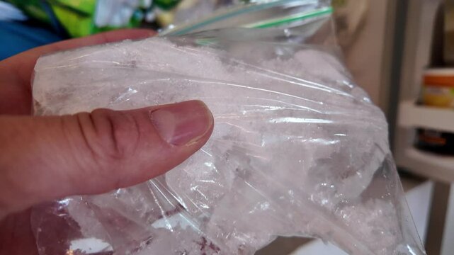 Icepack Being Taken out of the Freezer for Soothing Relief