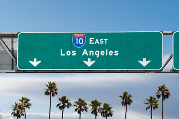 Los Angeles Interstate 10 east freeway arrow sign with palm trees.  