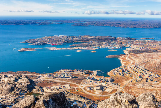 Aerial panoramic full view of Nuuk city and fjord from the top of Store Malena mountain, Greenland