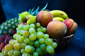 Delicious fruits with wonderful colors, taken under artificial light