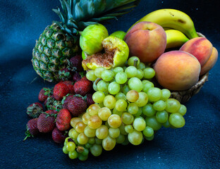 Delicious fruits with wonderful colors, taken under artificial light