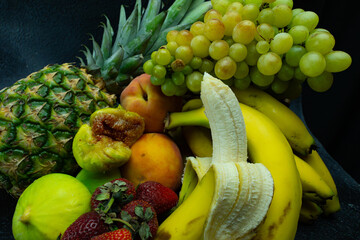 Delicious fruits with wonderful colors, taken under artificial light