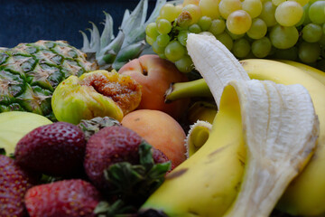 Delicious fruits with wonderful colors, taken under artificial light