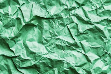 Fototapeta premium Green crumpled paper macro close-up abstract texture. AI generated