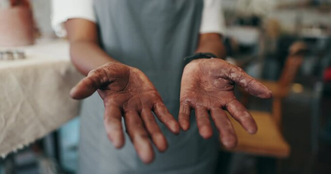 Dirty, hands and pottery with man in workshop closeup for art, crafts or creative hobby. Mud, palms and terracotta with master potter or sculptor in studio for professional craftsmanship process