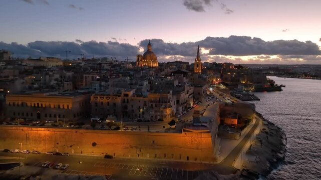 4k Aerial shot of Valletta old town in Malta during sunset.