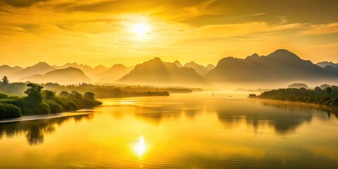 Naklejka premium Sunrise over vast Yellow River landscape with misty mountains and calm water , riverbank, rivers, riverbank, rivers