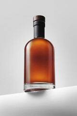 Whiskey glass bottle on white isolated background